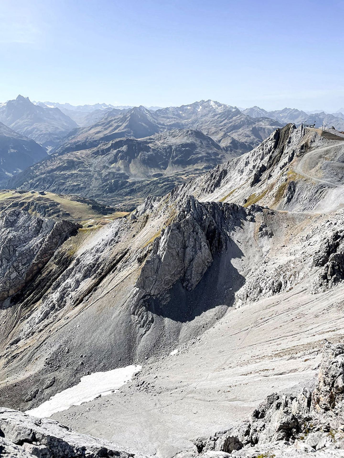 Rocky high-alpine landscape with a panorama of the Arlberg mountain ranges