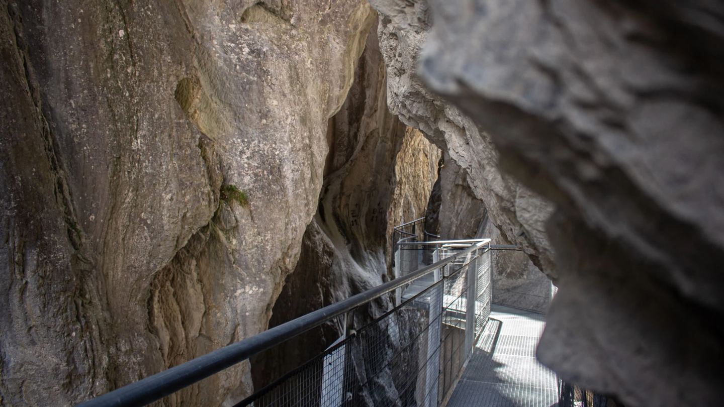 Walkway through the Schnann Gorge between high rock walls near St. Anton am Arlberg