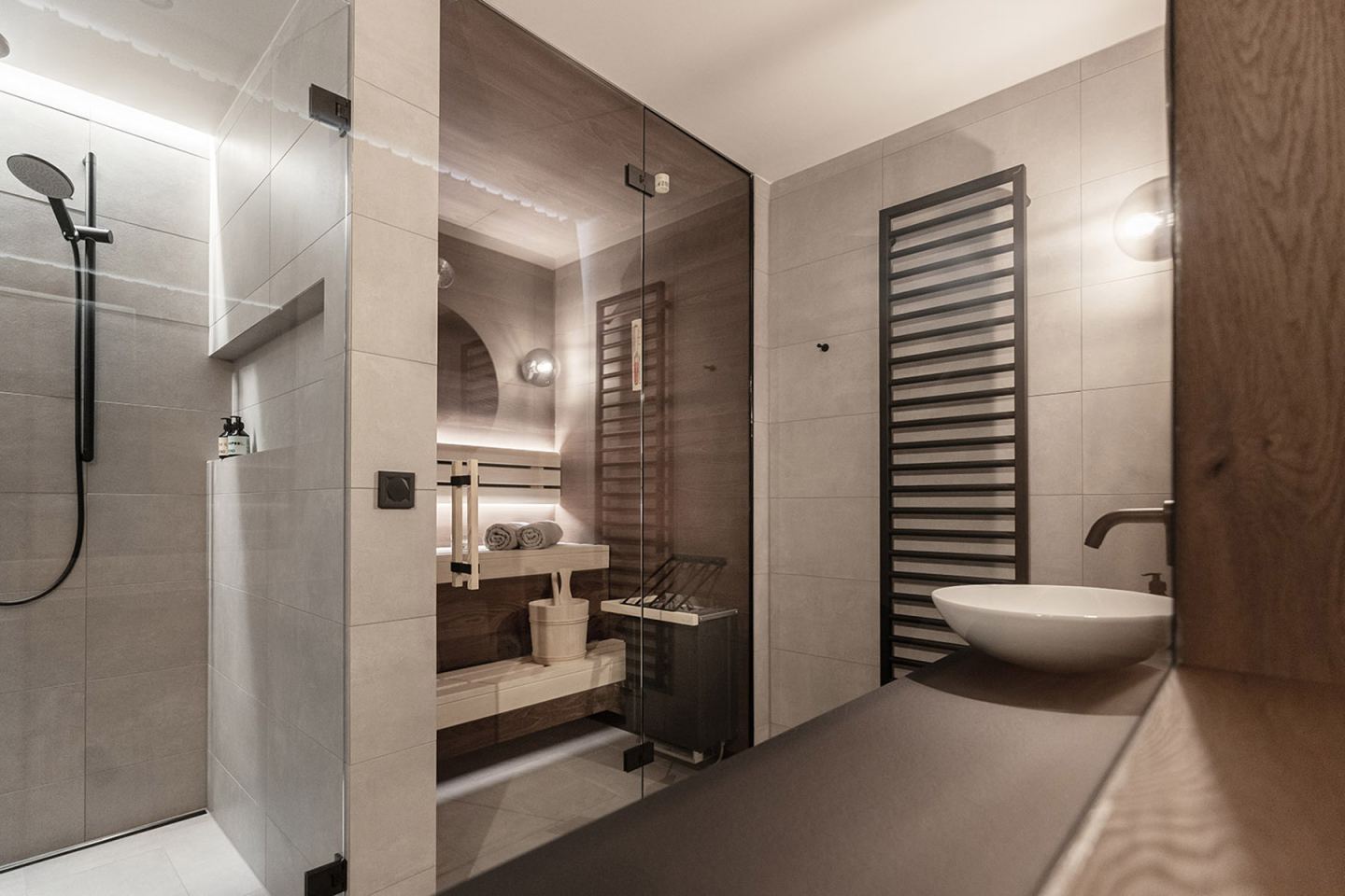 Bathroom with private sauna and walk-in shower in Omaela Apartment 2